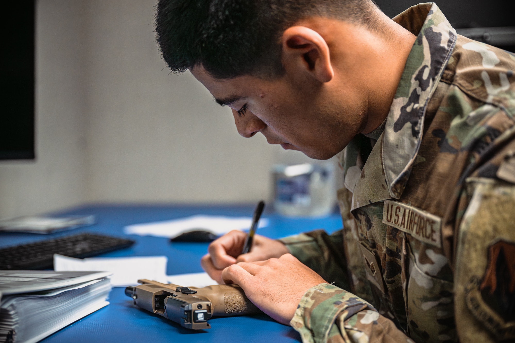 Airman validates weapon serial numbers