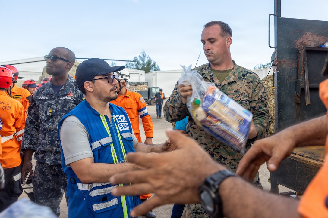 U.S. service members with Joint Task Force-Bravo load supplies aboard a U.S. Army CH-47 Chinook with 1st Battalion, 228th Aviation Regiment, JTF-B, in support of foreign assistance following Hurricane Melissa, in Kingston, Jamaica, Nov. 6, 2025. At the direction and request of U.S. Southern Command and Jamaica's government, the 22nd MEU(SOC) supports Joint Task Force-Bravo by providing foreign assistance in the wake of Hurricane Melissa to alleviate suffering and help stabilize affected communities. (U.S. Marine Corps photo)