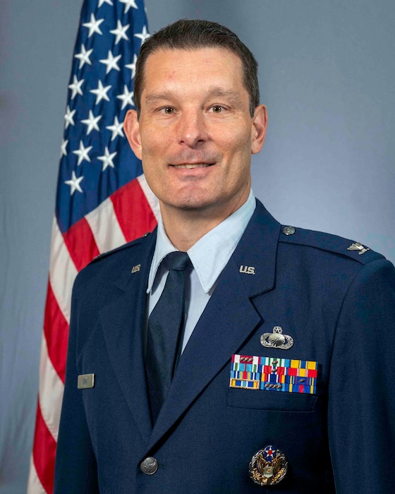 Man in Air Force dress blues uniform.