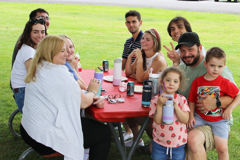 U.S. Army Corps of Engineers Buffalo District Resident Engineer of the Guterl Resident Office Chris Ignatowski and his family gather with other teammates during the district’s annual summer picnic in Niagara Falls, N.Y.