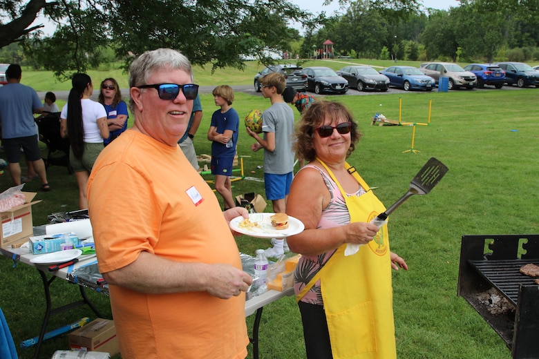 Debbie Lewandowski, an emergency management specialist with the U.S. Army Corps of Engineers Buffalo District, and Michael Ferrari, a civil engineer tech with the district, stand near the grill during the district’s Corps Day picnic at Oppenheim Park in Wheatfield, N.Y.,