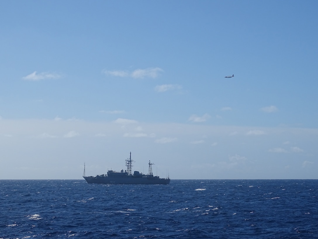 A Coast Guard HC-130 Hercules airplane crew from Air Station Barbers Point monitors a Russian military vessel approximately 15 nautical miles south of Oahu Oct. 29, 2025. Coast Guard personnel are monitoring the vessel’s activities near U.S. territorial waters, which extend to 12 miles offshore. (U.S. Coast Guard photo, courtesy Cutter William Hart)