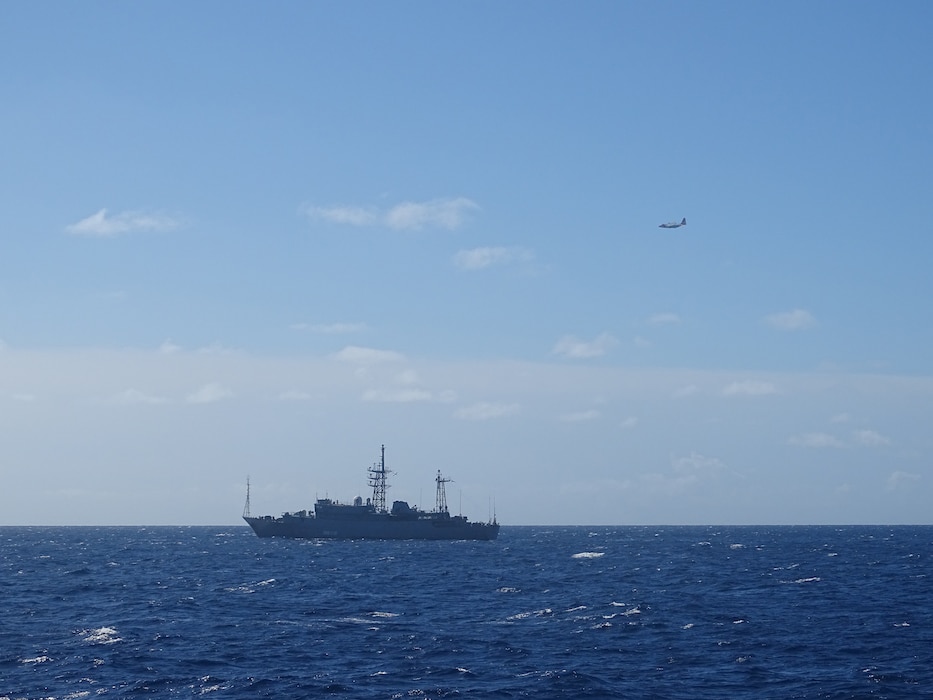 A Coast Guard HC-130 Hercules airplane crew from Air Station Barbers Point monitors a Russian military vessel approximately 15 nautical miles south of Oahu Oct. 29, 2025.