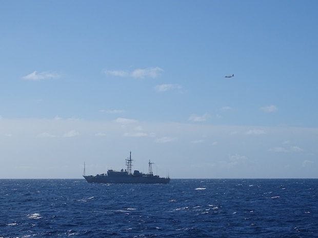 A Coast Guard HC-130 Hercules airplane crew from Air Station Barbers Point monitors a Russian military vessel approximately 15 nautical miles south of Oahu Oct. 29, 2025.