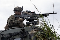 U.S. Marine Corps Sgt. Dawson Dauzat, a high mobility artillery rocket system operator assigned to 3rd Battalion, 12th Marine Regiment, 3rd Marine Division, operates an M240B machine gun during a live-fire mission at the Combined Arms Training Center, Camp Fuji, Japan, Oct. 26, 2025.