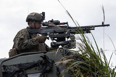 SHIZUOKA, Japan (Oct. 26, 2025) — U.S. Marine Corps Sgt. Dawson Dauzat, a high mobility artillery rocket system operator assigned to 3rd Battalion, 12th Marine Regiment, 3rd Marine Division, operates an M240B machine gun during a live-fire mission...
