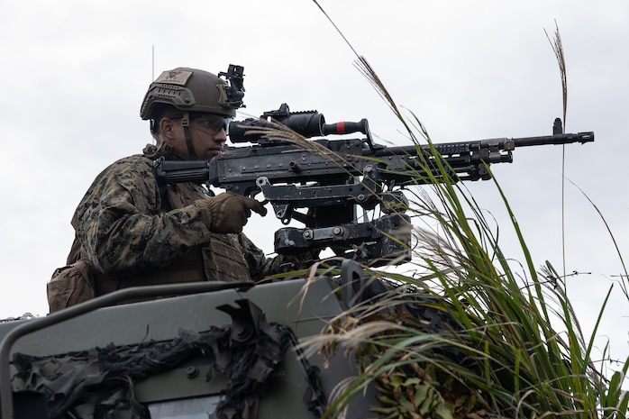 U.S. Marine Corps Sgt. Dawson Dauzat, a high mobility artillery rocket system operator assigned to 3rd Battalion, 12th Marine Regiment, 3rd Marine Division, operates an M240B machine gun during a live-fire mission at the Combined Arms Training Center, Camp Fuji, Japan, Oct. 26, 2025.