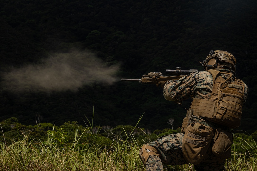 U.S. Marine Corps Lance Cpl. Dario Astuhuaman, a rifleman with 1st Light Armored Reconnaissance Company, Battalion Landing Team 1st Battalion, 7th Marine Regiment, 31st Marine Expeditionary Unit, fires an M27 Infantry Automatic Rifle during a live fire range at Camp Schwab, Okinawa, Japan, Sep. 26, 2025.
