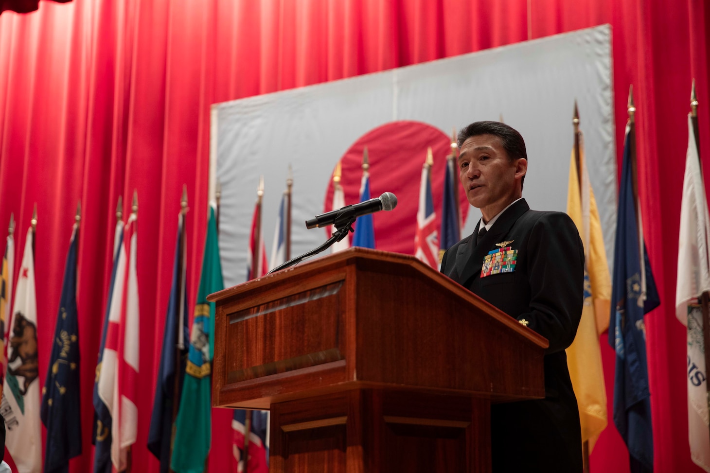 Japan Maritime Self-Defense Force Commander in Chief, Self Defense Fleet Vice Adm. OMACHI Katsushi, speaks during the U.S. 7th Fleet Change of Command ceremony at the Fleet Theater on board Commander, Fleet Activities Yokosuka, Nov. 13.