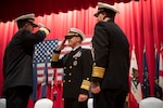 Vice Adm. Patrick Hannifin, left, salutes  Adm. Steve Koehler, commander, U.S. Pacific Fleet, as he assumes command of Commander, U.S. 7th Fleet from Vice Adm. Fred Kacher, right, during the U.S. 7th Fleet Change of Command ceremony on board Commander, Fleet Activities Yokosuka, Nov. 13.