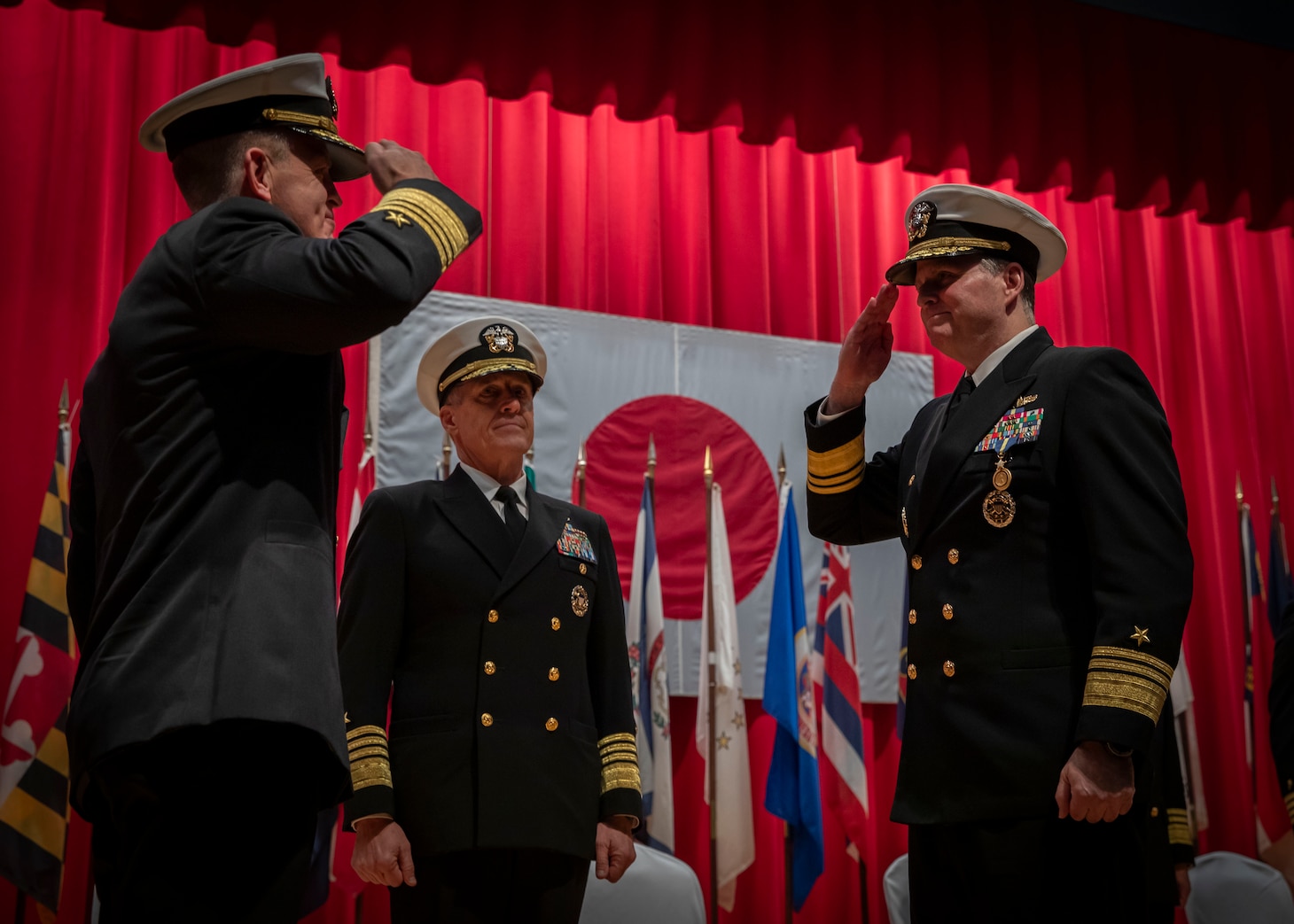 Vice Adm. Fred Kacher, right, turns over command of Commander, U.S. 7th Fleet to Vice Adm. Patrick Hannifin, left, during the U.S. 7th Fleet Change of Command ceremony onboard Commander, Fleet Activities Yokosuka, Nov. 13, 2025.