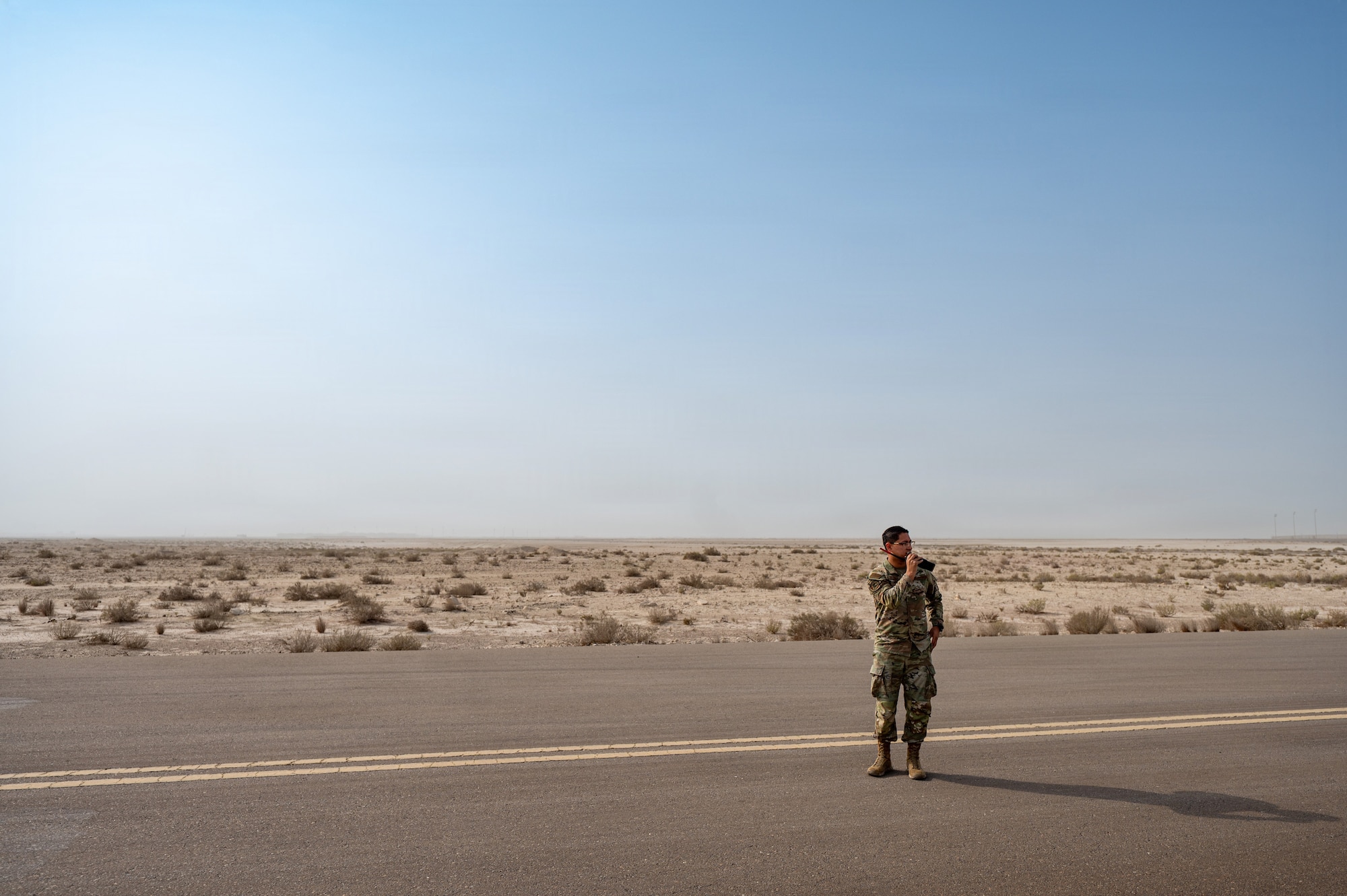 uniformed man speaks on radio