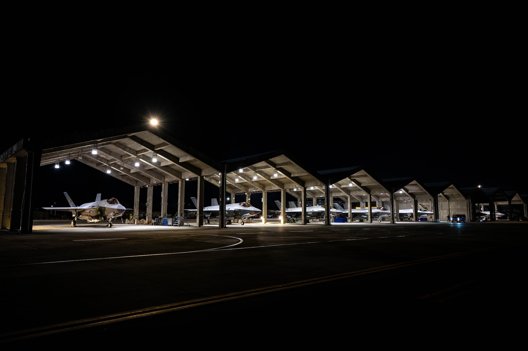 Several F-35As Lightning IIs sit static.