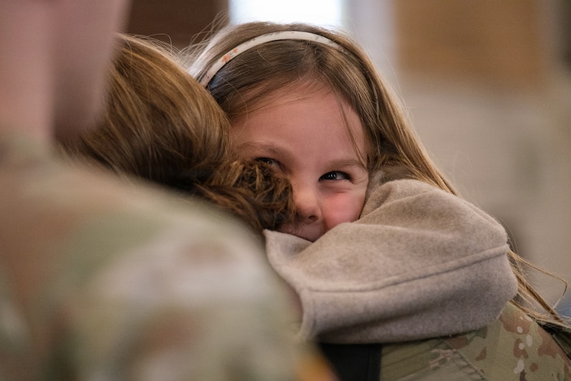U.S. Army Reserve 1st Lt. Vanessa Medina, the 510th Regional Support Group’s Headquarters and Headquarters Company executive officer, poses for a photo besides her spouse after the conclusion of her unit’s farewell ceremony Oct. 24, 2025, at Daenner Chapel on Daenner Kaserne. The 510th RSG, 7th Mission Support Command, is scheduled to mobilize across the European theater, assuming base support and life-sustainment operation responsibilities from the 297th RSG of the Alaska National Guard, reinforcing the Army’s deterrence posture along the eastern flank. (U.S. Army Reserve photo by Lt. Col. William Wratee).