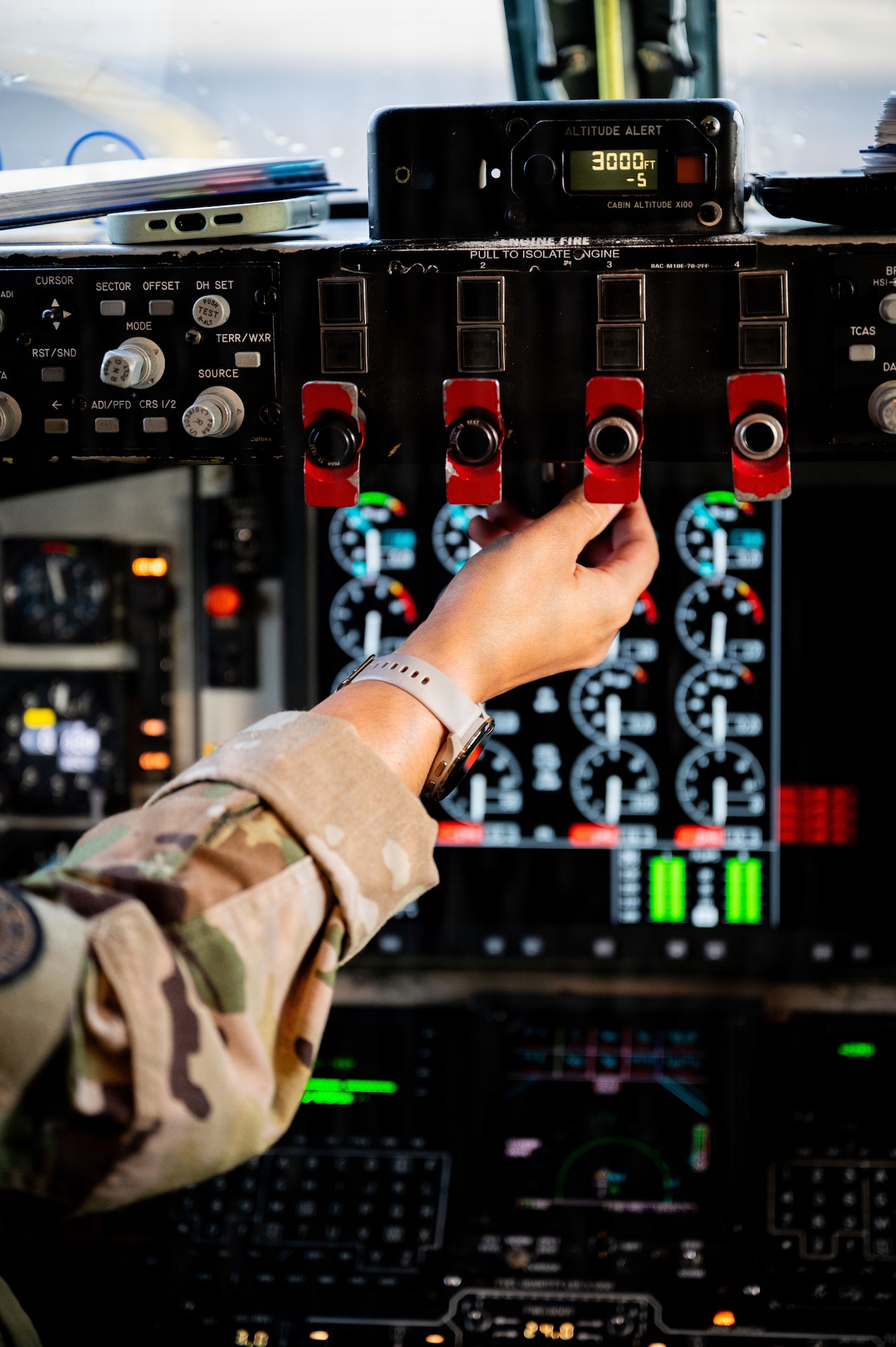 U.S. Air Force Capt. Kanchan Potter, 351st Air Refueling Squadron pilot, performs pre-flight checks inside a KC-135 Stratotanker aircraft from the 100th Air Refueling Wing during exercise Ocean Sky at RAF Mildenhall, England, Oct. 15, 2025.