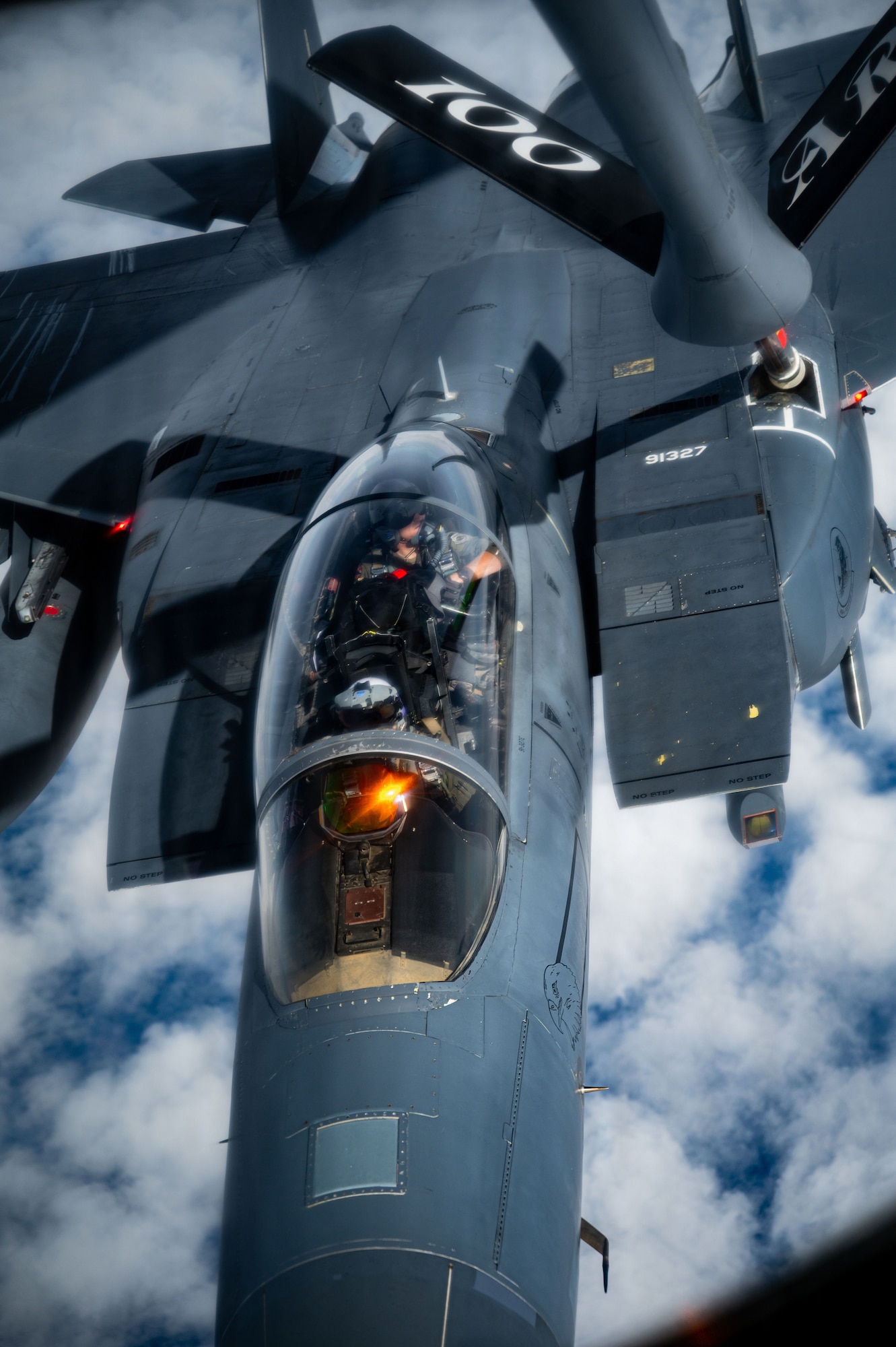 A U.S. Air Force F-15E Strike Eagle from the 48th Fighter Wing, RAF Lakenheath, approaches a KC-135 Stratotanker from the 100th Air Refueling Wing during exercise Ocean Sky, over the Atlantic Ocean, Oct. 15, 2025.