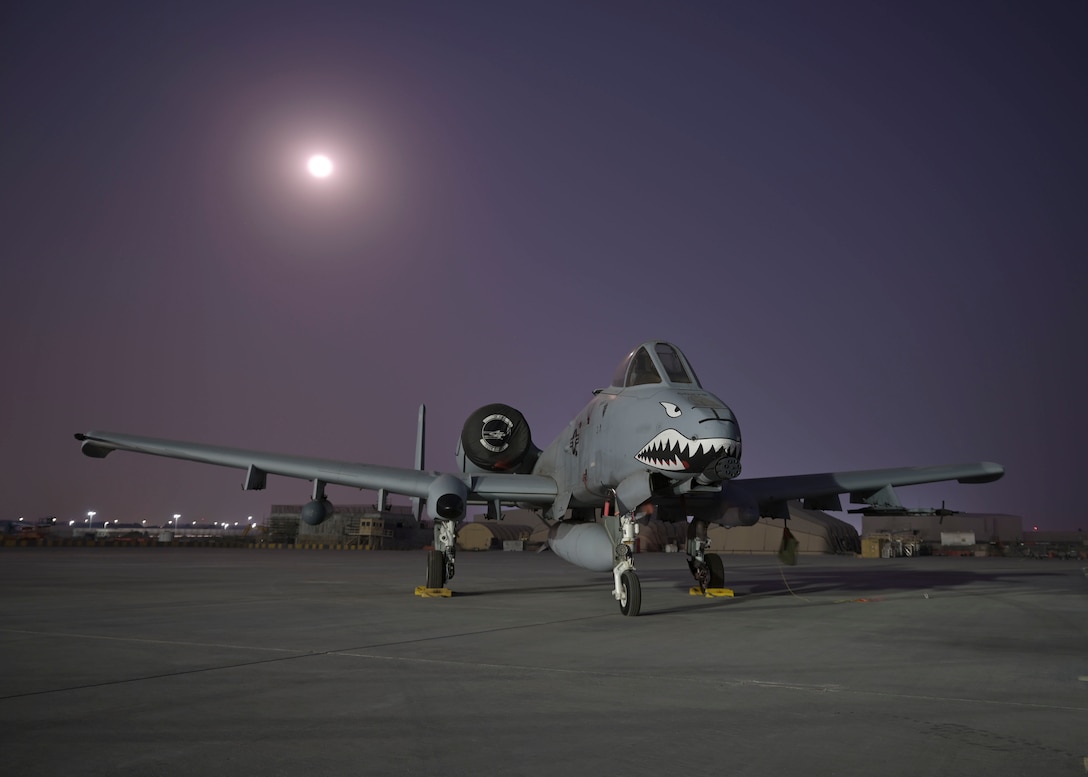 A U.S. Air Force A-10C Thunderbolt II aircraft, assigned to the 75th Expeditionary Fighter Squadron sits on a flight line within the U.S. Central Command area of responsibility, Nov. 4, 2025. The A-10 is outfitted with a 30mm GAU-8/A Gatling gun that is capable of firing 3,900 rounds a minute and has primarily been used against ground targets such as tanks. (U.S. Air Force photo by Senior Airman Paige Weldon)