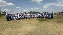 United States Air Force Tech Sgt. Dan Antonio Deladingco, 9th Mission Support Group (MSG) executive assistant, poses in a photo alongside the rest of Team USA during the 2025 International Practical Shooting Confederation (IPSC) Handgun World Shoot in Stilfontein, South Africa, Aug. 27, 2025.