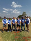 United States Air Force Tech Sgt. Dan Antonio Deladingco, 9th Mission Support Group (MSG) executive assistant, poses in a photo alongside other Team USA members in the Armed Forces during the 2025 International Practical Shooting Confederation (IPSC) Handgun World Shoot in Stilfontein, South Africa, Aug. 27, 2025.