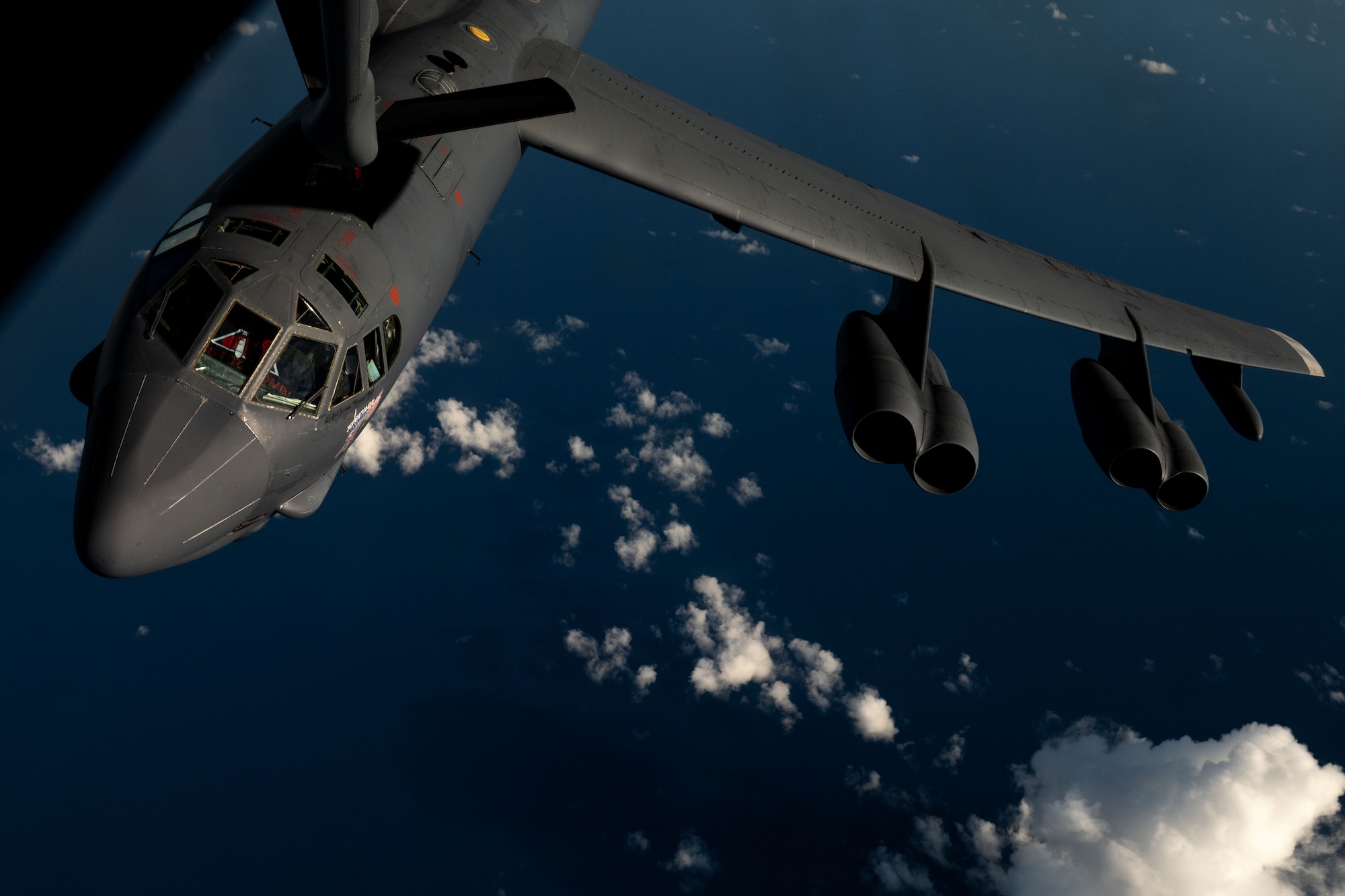 A U.S. Air Force B-52H Stratofortress bomber assigned to the 2nd Bomb Wing, receives fuel from a KC-135 Stratotanker aircraft assigned to the 6th Air Refueling Wing, in the U.S. Southern Command area of responsibility, Oct. 15, 2025. B-52s are world-wide deployable and deter foreign terrorist and transnational criminal organizations, which threaten the safety, security and stability of the Western Hemisphere. (U.S. Air Force photo by Senior Airman Zachary Foster)