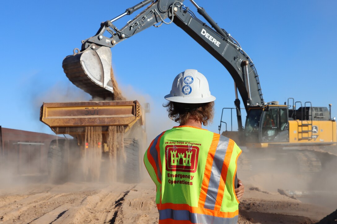 The U.S. Army Corps of Engineers monitors ground stabilization construction in preparation for panel placement at the BMGR-1 project site near Yuma, Arizona, Oct. 28. USACE is replacing permanent border barriers along the southern border of the U.S. at the direction of the U.S. Army by the Secretary of War, in response to the presidential national emergency declaration dated Jan. 20, 2025, authorizing the use of Section 2803 of Title 10, U.S. Code.
