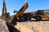 The U.S. Army Corps of Engineers contractors conduct trench stabilization construction in preparation for panel placement at the BMGR-1 border barrier project site near Yuma, Arizona, Oct. 28. USACE is replacing permanent border barriers along the southern border of the U.S. at the direction of the U.S. Army by the Secretary of War, in response to the presidential national emergency declaration dated Jan. 20, 2025, authorizing the use of Section 2803 of Title 10, U.S. Code.