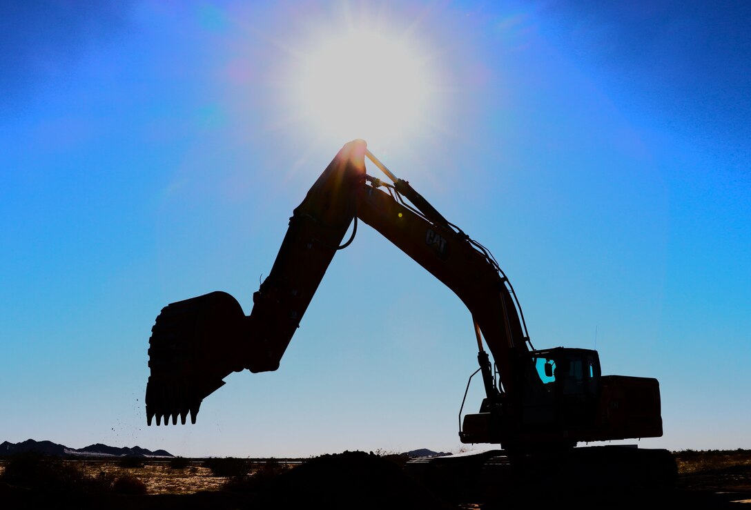 The U.S. Army Corps of Engineers contractors conduct trench stabilization construction in preparation for panel placement at the BMGR-1 border barrier project site near Yuma, Arizona, Oct. 28. USACE is replacing permanent border barriers along the southern border of the U.S. at the direction of the U.S. Army by the Secretary of War, in response to the presidential national emergency declaration dated Jan. 20, 2025, authorizing the use of Section 2803 of Title 10, U.S. Code.