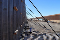 The U.S. Army Corps of Engineers South Pacific Border Task Force’s BMGR-1 border barrier project site near Yuma, Arizona, Oct. 28. USACE is replacing permanent border barriers along the southern border of the U.S. at the direction of the U.S. Army by the Secretary of War, in response to the presidential national emergency declaration dated Jan. 20, 2025, authorizing the use of Section 2803 of Title 10, U.S. Code.