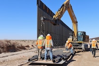 U.S. Army Corps of Engineers South Pacific Border Task Force install border barrier panels at the BMGR-1 project site near Yuma, Arizona, Oct. 29. USACE is replacing permanent border barriers along the southern border of the U.S. at the direction of the U.S. Army by the Secretary of War, in response to the presidential national emergency declaration dated Jan. 20, 2025, authorizing the use of Section 2803 of Title 10, U.S. Code
