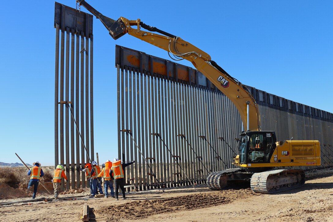U.S. Army Corps of Engineers South Pacific Border Task Force install border barrier panels at the BMGR-1 project site near Yuma, Arizona, Oct. 29. USACE is replacing permanent border barriers along the southern border of the U.S. at the direction of the U.S. Army by the Secretary of War, in response to the presidential national emergency declaration dated Jan. 20, 2025, authorizing the use of Section 2803 of Title 10, U.S. Code