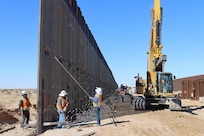 U.S. Army Corps of Engineers South Pacific Border Task Force install border barrier panels at the BMGR-1 project site near Yuma, Arizona, Oct. 29. USACE is replacing permanent border barriers along the southern border of the U.S. at the direction of the U.S. Army by the Secretary of War, in response to the presidential national emergency declaration dated Jan. 20, 2025, authorizing the use of Section 2803 of Title 10, U.S. Code