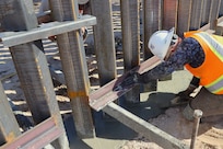 U.S. Army Corps of Engineers South Pacific Border Task Force install border barrier panels at the BMGR-1 project site near Yuma, Arizona, Oct. 29. USACE is replacing permanent border barriers along the southern border of the U.S. at the direction of the U.S. Army by the Secretary of War, in response to the presidential national emergency declaration dated Jan. 20, 2025, authorizing the use of Section 2803 of Title 10, U.S. Code