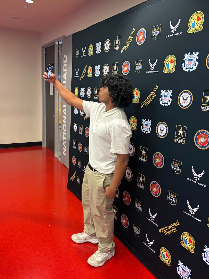 An applicant takes a selfie at Los Angeles MEPS. Applicants at Los Angeles MEPS are celebrating their first step into military service at a new patriotic selfie station that connects them to a nationwide community of service members.