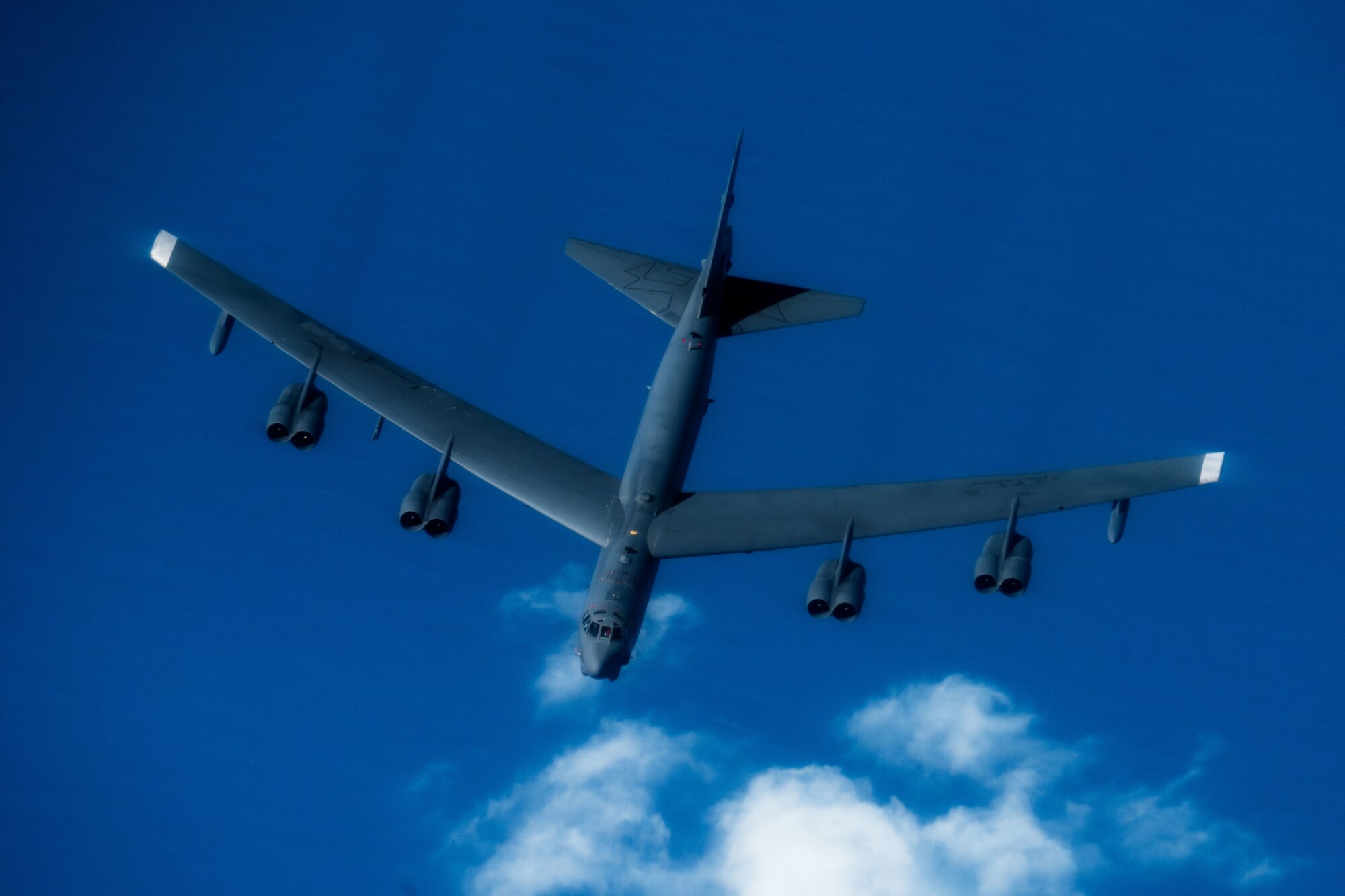 A U.S. Air Force B-52 Stratofortress bomber assigned to the 2nd Bomb Wing, navigates in the U.S. Southern Command area of responsibility, Oct. 15, 2025. Bomber Attack Demonstrations contributed to the collective defense of the Western Hemisphere and demonstrate the U.S. commitment to the safety and security of the region. (U.S. Air Force photo by Senior Airman Zachary Foster)