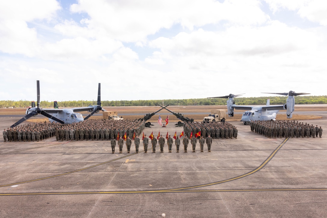 U.S. Marines with Marine Rotational Force – Darwin 25.3 participate in a group photo at Royal Australian Air Force Base, Darwin, Australia, Sept. 9, 2025. MRF-D is an annual six-month rotational deployment to enhance interoperability with the Australian Defence Force and provide a forward postured crisis response force in the Indo-Pacific. (U.S. Marine Corps photo by Sgt. Ezekieljay Correa)