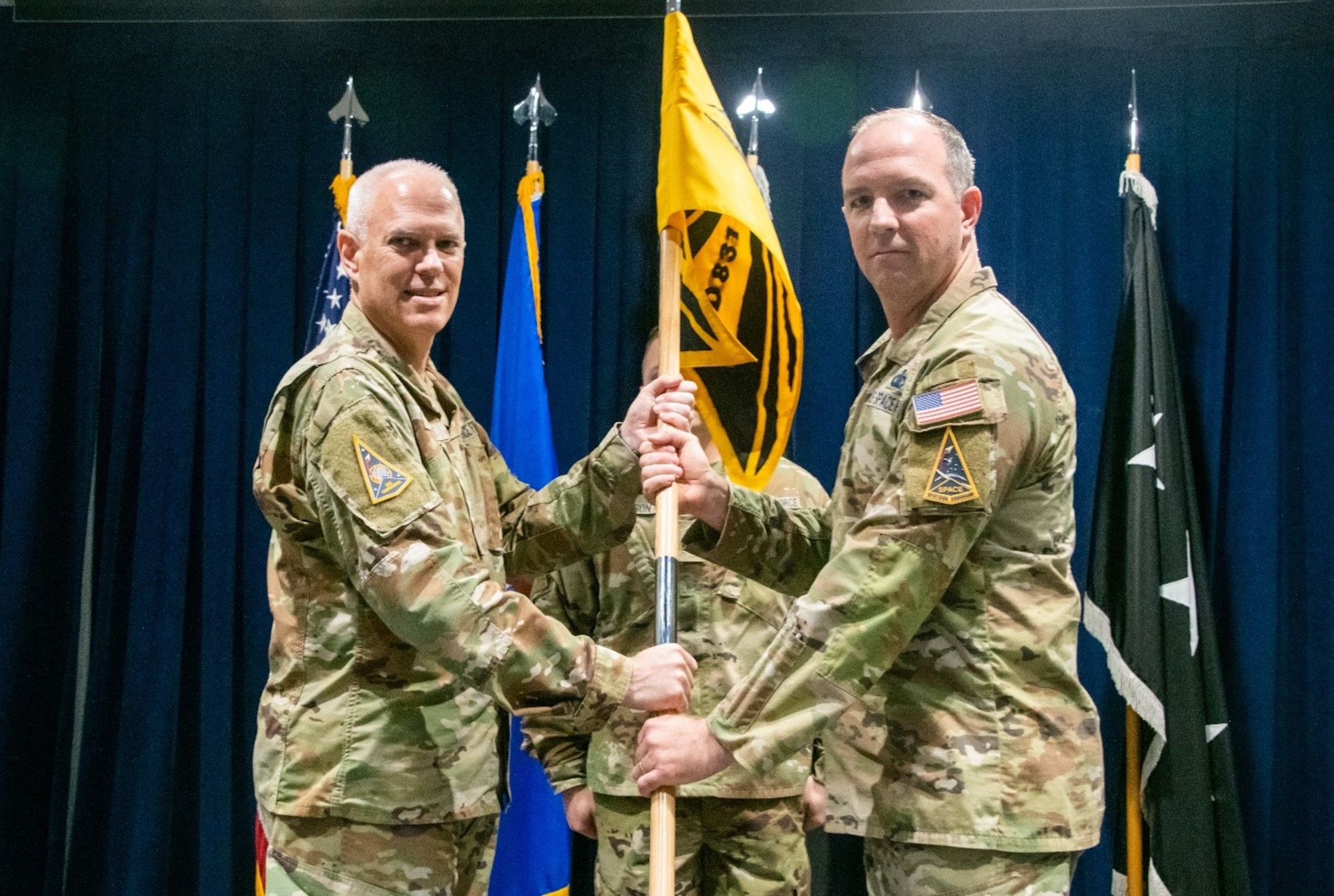 USSF Lt. Gen. Phil Garrant, SSC commander, presides over the ceremony at which USSF Col. Neil Barnas assumes command of Systems Delta 831 on October 2, 2025 at Los Angeles Air Force Base.