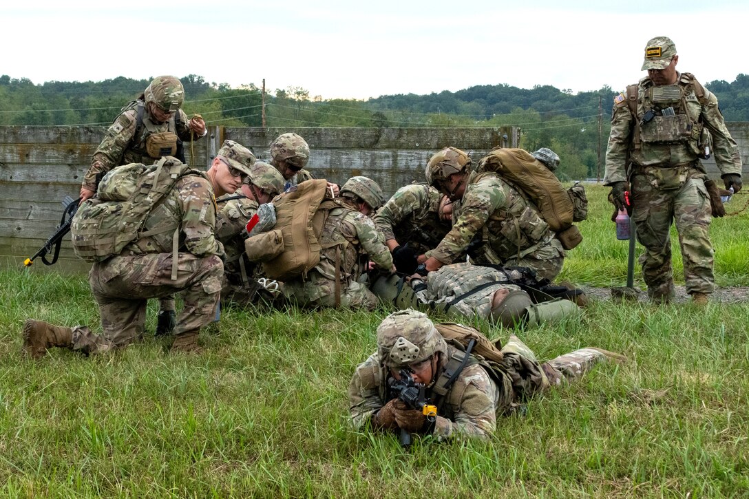 Soldiers from all components – U.S. Army, Army National Guard and Army Reserve – participate in a rigorous field training exercise leading up to the culminating event at the end of their 68W (Combat Medic) Military Occupational Specialty Transition Course at Fort Indiantown Gap’s Medical Battalion Training Site Aug. 29. The 57-day course, conducted by cadre from the Pennsylvania Army National Guard’s 4th Battalion, 166th Regiment-Regional Training Institute, prepares Soldiers from other MOSs to become 68Ws, and exercises such as this tests all the skills they’ve learned throughout the course, certifying them as Combat Medics. (Pennsylvania National Guard photo by Wayne V. Hall)