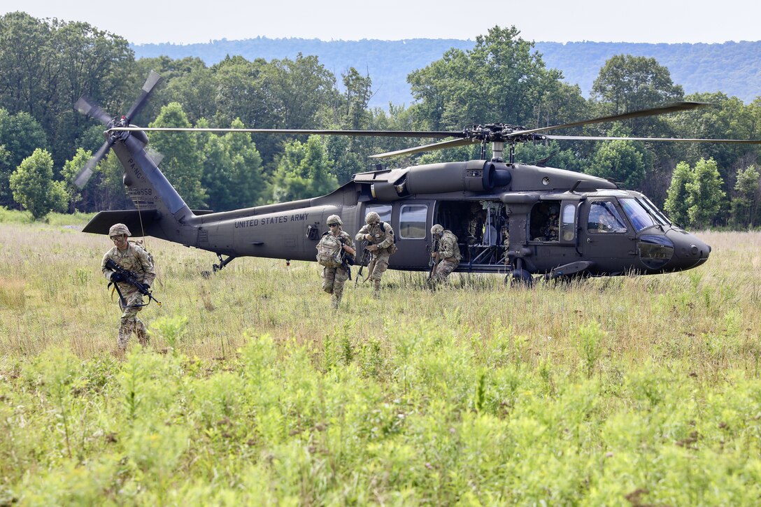 U.S. Soldiers with 1st Battalion, 109th Infantry Regiment perform combat maneuvers during an exercise at Fort Indiantown Gap, Pennsylvania, July 29, 2025. The Soldiers trained in an intensive 96 hour force-on-force exercise to simulate combat against a capable adversary. (U.S. Army National Guard photo by Staff Sgt. Zachery Jockel)