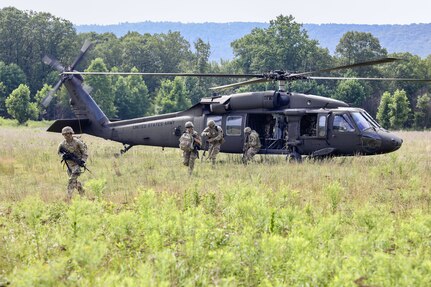 U.S. Soldiers with 1st Battalion, 109th Infantry Regiment perform combat maneuvers during an exercise at Fort Indiantown Gap, Pennsylvania, July 29, 2025. The Soldiers trained in an intensive 96 hour force-on-force exercise to simulate combat against a capable adversary. (U.S. Army National Guard photo by Staff Sgt. Zachery Jockel)