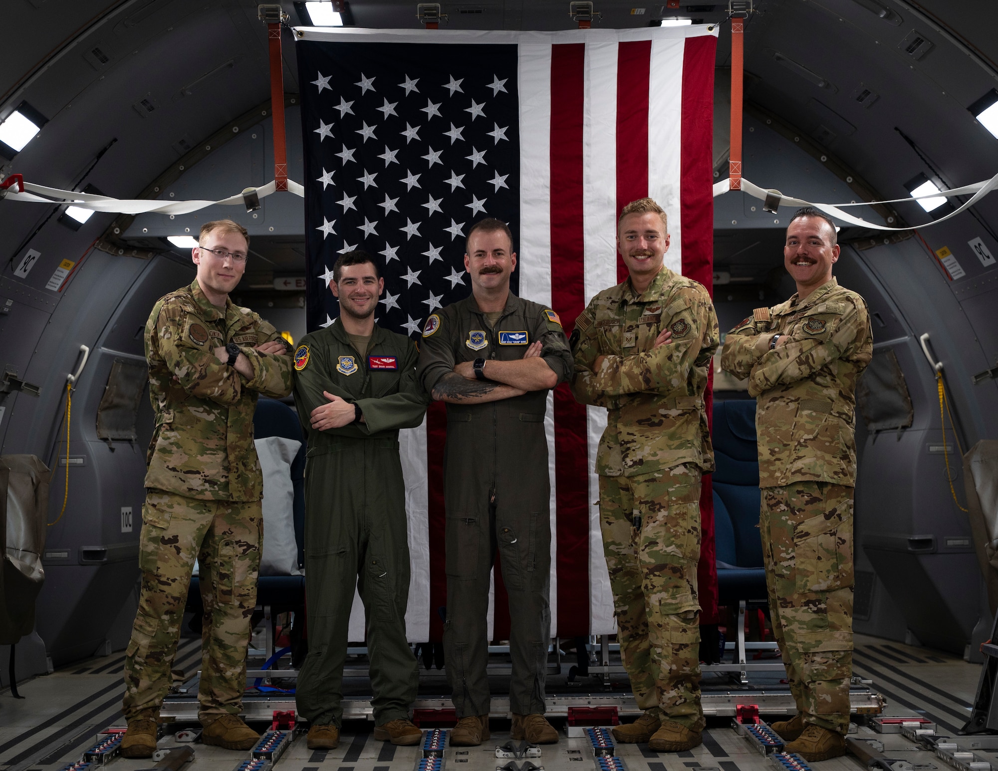 U.S. Air Force Staff Sgt. Michael Hagebusch, a mission system operator assigned to the 22nd Operations Support Squadron at McConnell Air Force Base, Kansas, performs a demonstration of a Taclane Augmented ROBE System onboard a KC-46 Pegasus at Andersen Air Force Base, Guam, during the Air Force’s 2025 Department-Level Exercise, July 24, 2025. The Taclane Augmented ROBE System allows ground crew, other aircraft and Air Operations Centers to be better connected, enabling an increased level of joint integration to operate and survive within contested environments. The DLE series encompasses all branches of the Department of Defense, along with allies and partners, employing more than 400 Joint and coalition aircraft and more than 12,000 members at more than 50 locations across 3,000 miles. (U.S. Air Force photo by Staff Sgt. Dalton Williams)