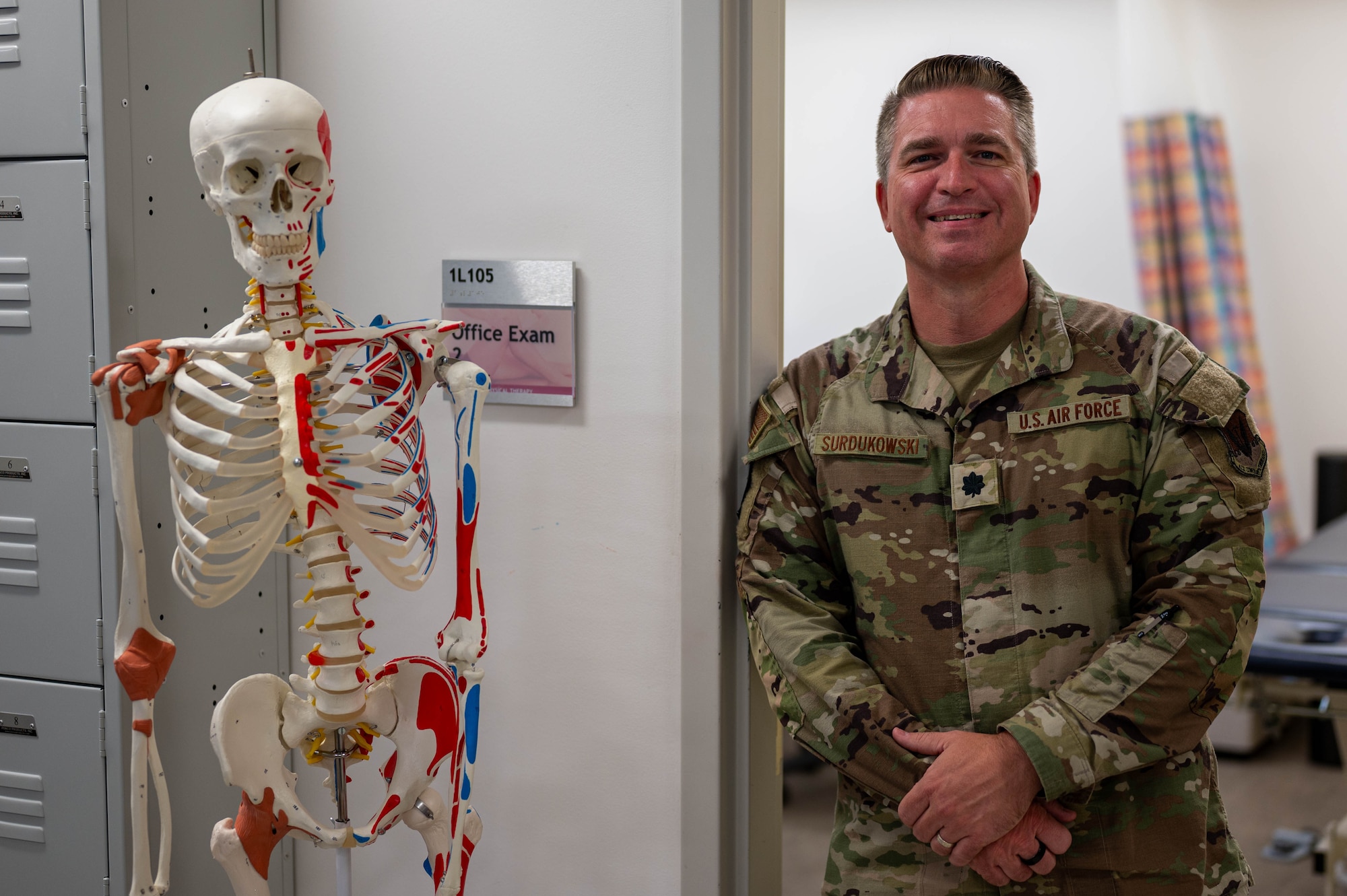 U.S. Air Force Lt. Col. Kristoffer Surdukowski, 325th Operational Medical Readiness Squadron physical therapy flight commander, poses for a photo at Tyndall Air Force Base.