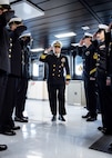 Rear Adm. Benjamin R. Nicholson, prospective Commander, Military Sealift Command (MSC), is piped aboard during MSC’s assumption of command ceremony held on board USNS Robert F. Kennedy  (T-AO 208) Nov. 13, 2025. The ceremony is a time-honored tradition that marked the moment a new commander formally takes charge of a unit in the absence of an outgoing commander.