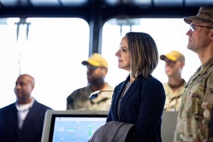 Laurie Beth Sargent, Human Resources Officer, Military Sealift Command (MSC), listens to remarks during Military Sealift Command’s assumption of command ceremony held on board USNS Robert F. Kennedy  (T-AO 208) Nov. 13, 2025. The ceremony is a time-honored tradition that marked the moment a new commander formally takes charge of a unit in the absence of an outgoing commander.
