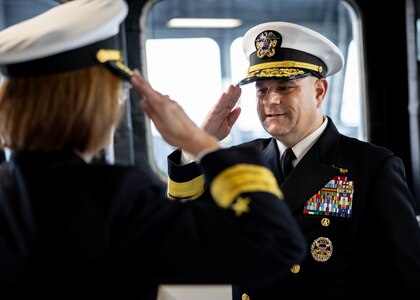 Rear Adm. Benjamin R. Nicholson, prospective Commander, Military Sealift Command (MSC), right, renders a salute to Vice Adm. John Gumbleton, acting Commander, U.S. Fleet Forces Command, and assumes the role of commanding officer during MSC’s assumption of command ceremony held on board USNS Robert F. Kennedy  (T-AO 208) Nov. 13, 2025. The ceremony is a time-honored tradition that marked the moment a new commander formally takes charge of a unit in the absence of an outgoing commander.