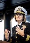 Rear Adm. Kimberly A. Walz, acting Commander, Military Sealift Command (MSC), delivers remarks during MSC’s assumption of command ceremony held on board USNS Robert F. Kennedy  (T-AO 208) Nov. 13, 2025. The ceremony is a time-honored tradition that marked the moment a new commander formally takes charge of a unit in the absence of an outgoing commander.