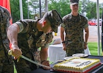 U.S. Marine Corps Lt. Col. Jeremy Smith, Indo-Pacific Deputy Director cuts a cake at the Daniel K. Inouye Center for Excellence on Joint Base Pearl Harbor-Hickam, HI, on Nov. 4, 2025.