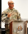 Col. Paul Metzdorff speaks during the 129th Regiment (Regional Training Institute) Change of Command Ceremony.