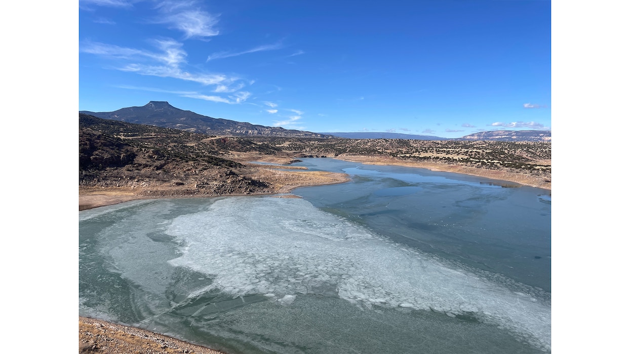 Ice pushes up against the toe of Abiquiu Dam, N.M., Feb. 8, 2025. Photo by Pamela Bowie.