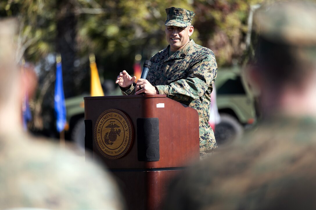 U.S. Marine Corps Sgt. Maj. Julian Lumm speaks to the audience following his retirement ceremony on Nov. 14 at Marine Corps Support Facility Blount Island, Florida. Reflecting on his 30-year career, Lumm shared his gratitude for the Marines, Sailors and civilians who shaped his journey, emphasizing the value of purpose, brotherhood and honor. (Official Marine Corps Photo by Dustin Senger)