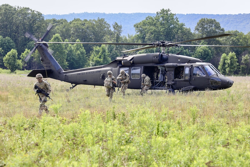 U.S. Soldiers with 1st Battalion, 109th Infantry Regiment perform combat maneuvers during an exercise at Fort Indiantown Gap, Pennsylvania, July 29, 2025. The Soldiers trained in an intensive 96 hour force-on-force exercise to simulate combat against a capable adversary. (U.S. Army National Guard photo by Staff Sgt. Zachery Jockel)